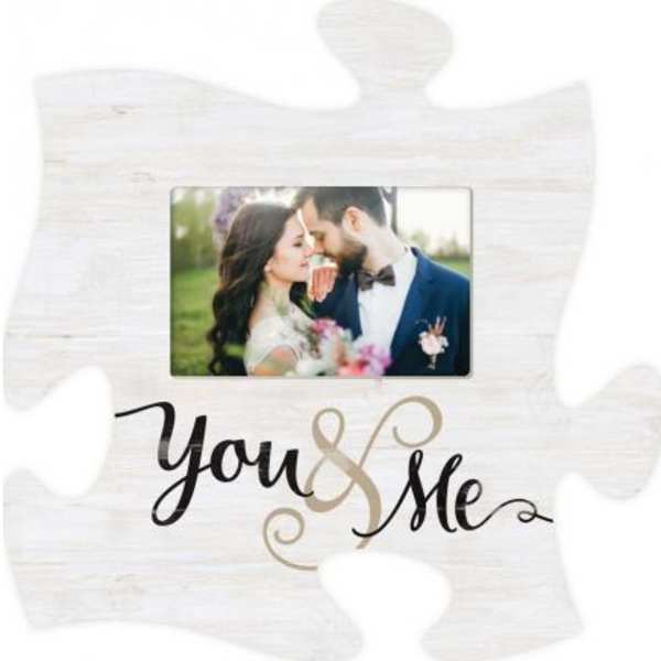 White decorative photo frame with "You & Me" text and a couple's picture