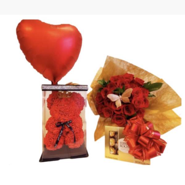 Heart balloon, rose teddy bear, bouquet, and chocolates on white background