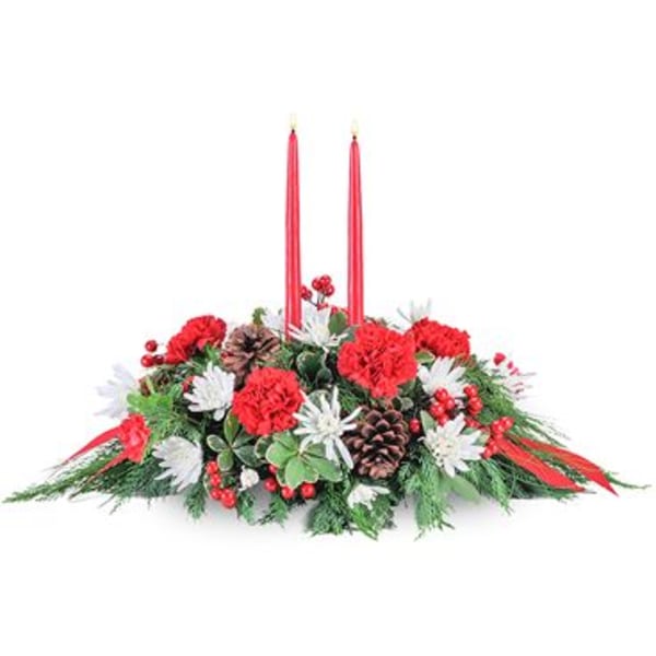 Holiday centerpiece with red candles and red-and-white flowers