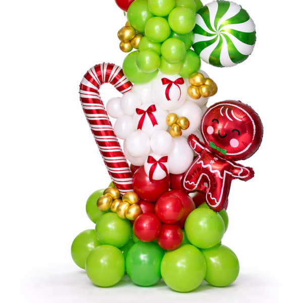 Christmas balloon sculpture with red, green, white, and gold balloons