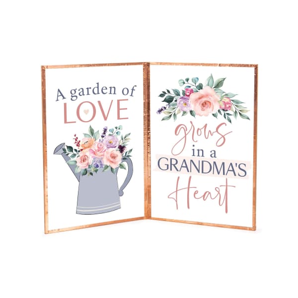 Two floral-themed printed signs with a watering can and "Grandma's Heart" text