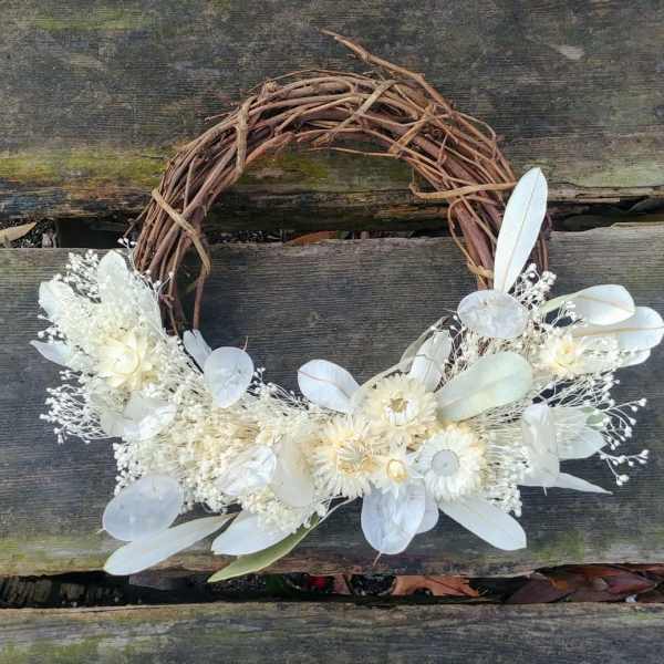 White floral wreath on a twig ring