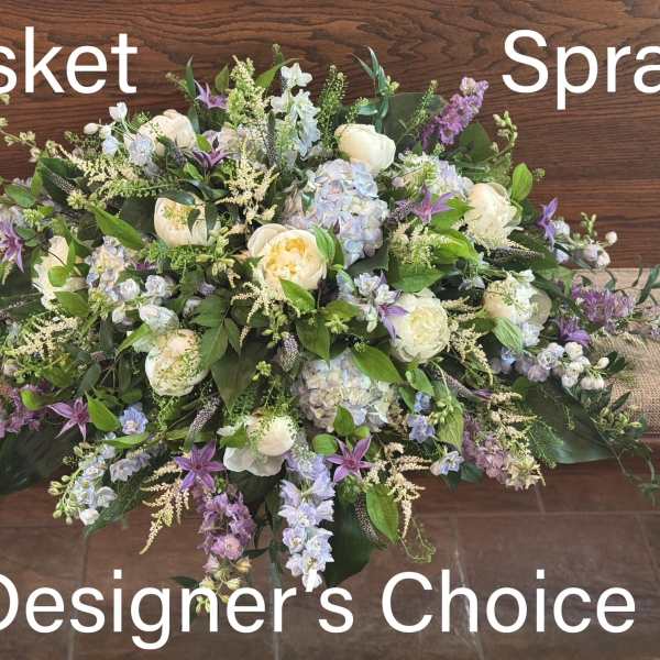 Large casket spray with white and lavender flowers