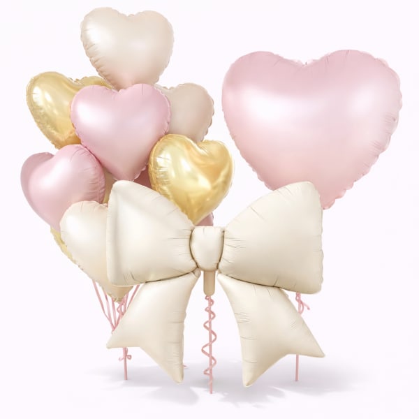 Cluster of pastel heart balloons with a large cream bow balloon