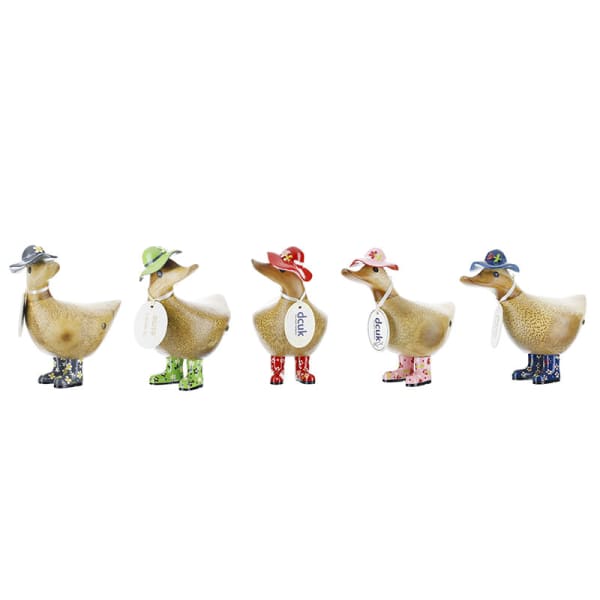 Five decorative duck figurines wearing colorful hats and boots
