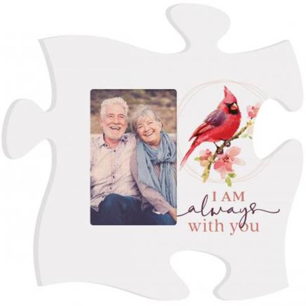 White puzzle-piece plaque with a couple's photo and a cardinal illustration