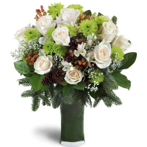 Bouquet of white roses and green mums in a tall vase