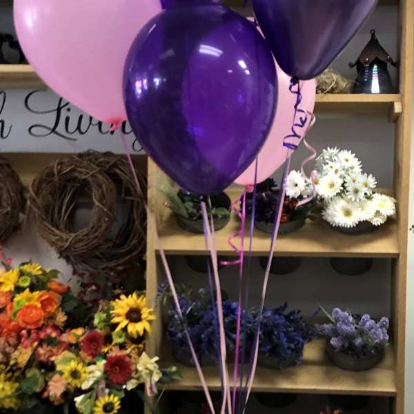 Bouquet with a teddy bear and purple, pink balloons