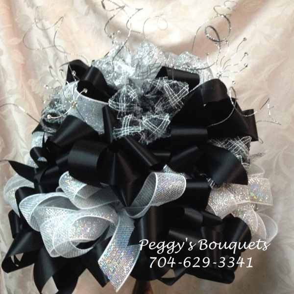 Black and silver decorative ribbon bouquet with curly wire accents