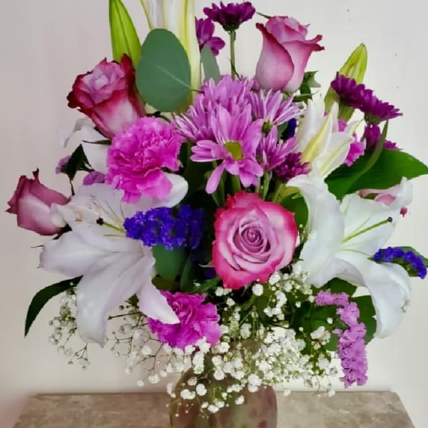 Pink and white mixed bouquet in a vase