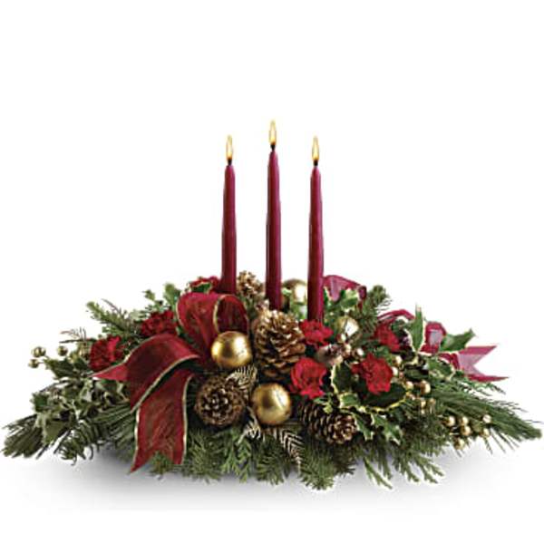 Christmas centerpiece with three burgundy candles and pinecones