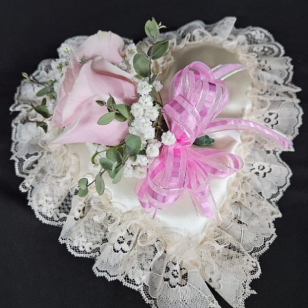 Pink rose with lace trim and ribbon bow