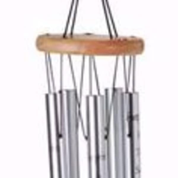 Hanging metal wind chime with a wooden top and oval tag