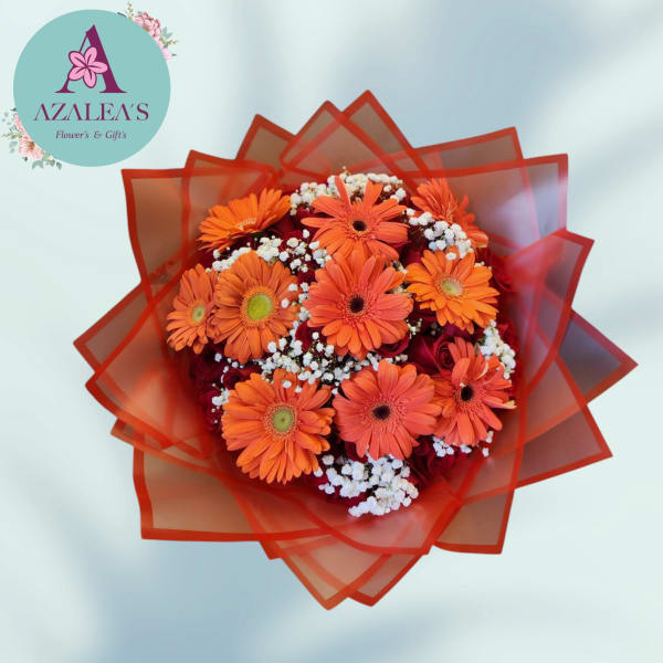 Orange gerbera daisy bouquet wrapped in red-orange paper