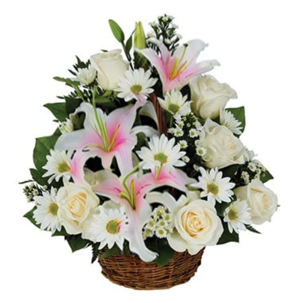 Basket arrangement of white roses, pink lilies, and white daisies