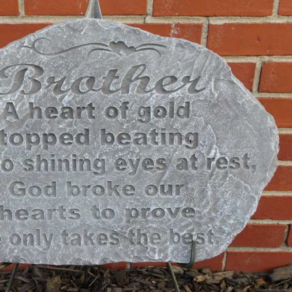 Engraved memorial stone with the word Brother and a poem