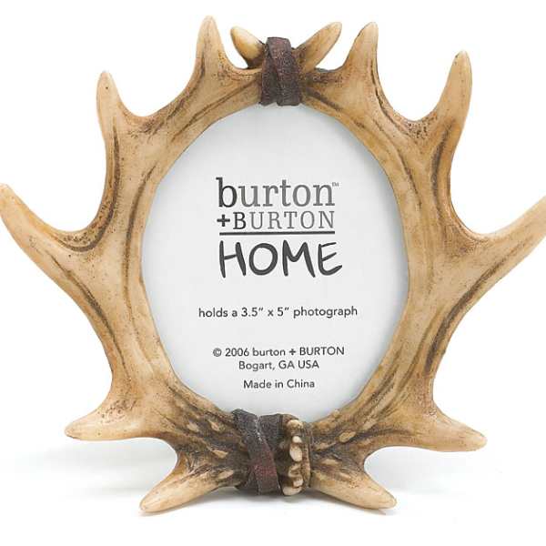 Antler-shaped photo frame holding a small picture