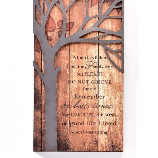 Wooden memorial sign with a tree silhouette and sympathy message