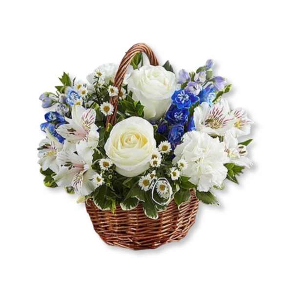 Basket arrangement of white roses, blue flowers, and white daisies