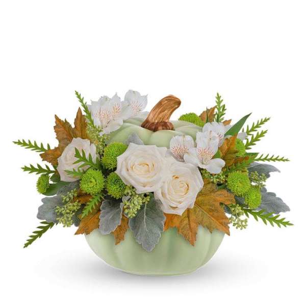 Pumpkin-shaped floral arrangement with white roses and white blossoms