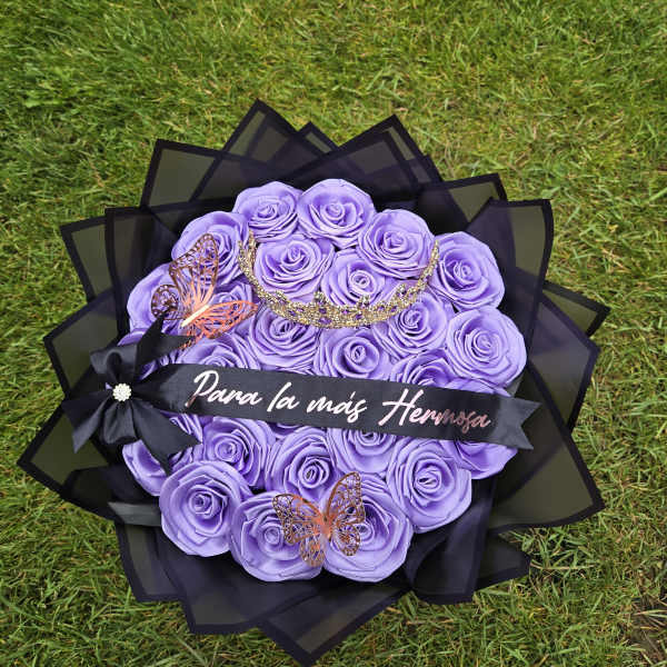 Purple rose bouquet with black wrapping and butterfly decorations