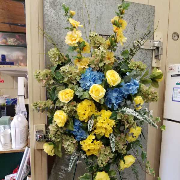 Yellow and Blue Flowers in a Spray.