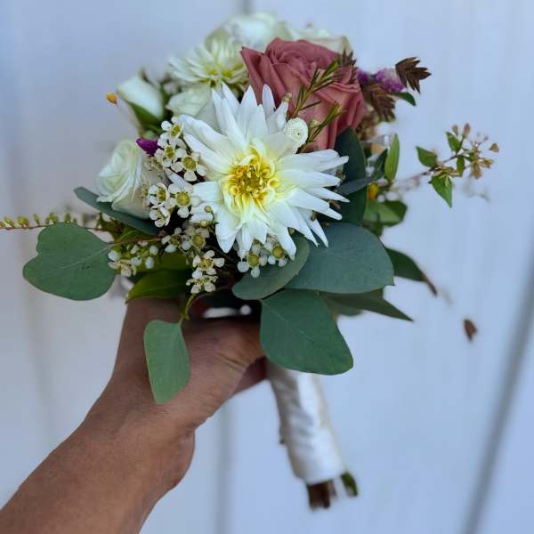 Handheld bouquet with white and pink flowers and eucalyptus