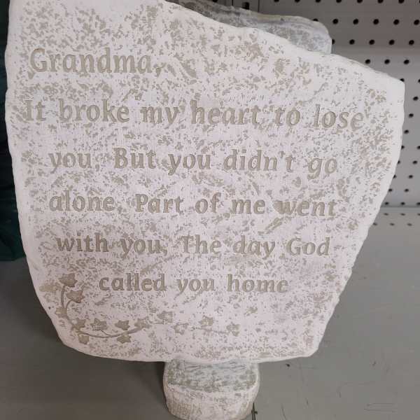 Decorative memorial stone with a sympathy quote