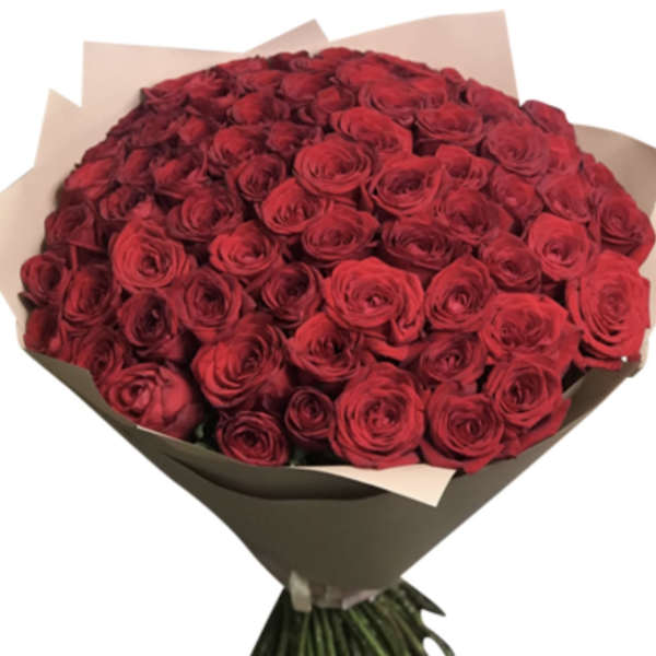 Large bouquet of red roses wrapped in brown paper