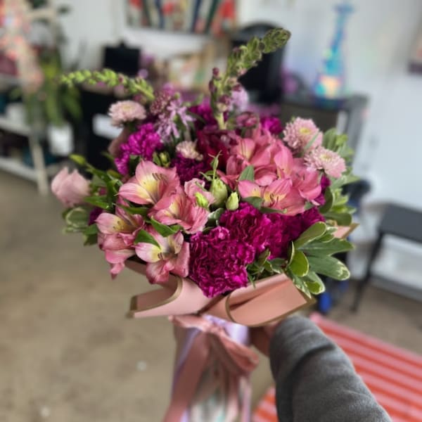 Pink and magenta bouquet with ribbon wrap
