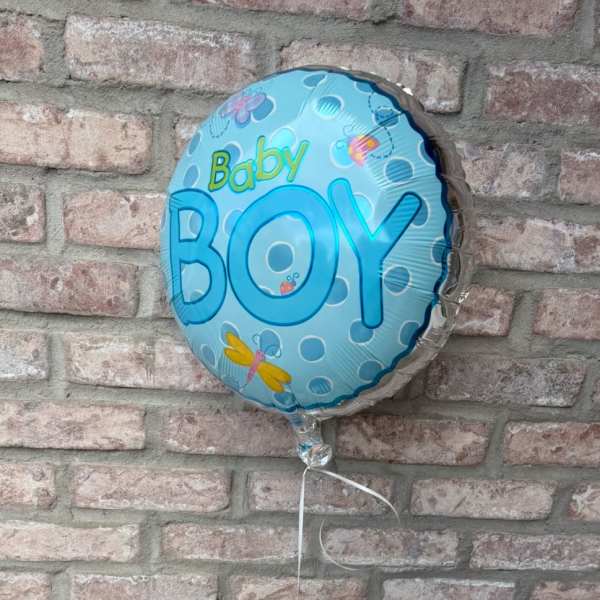 Baby boy balloon with white daisies and blue flowers in a glass cube vase.
