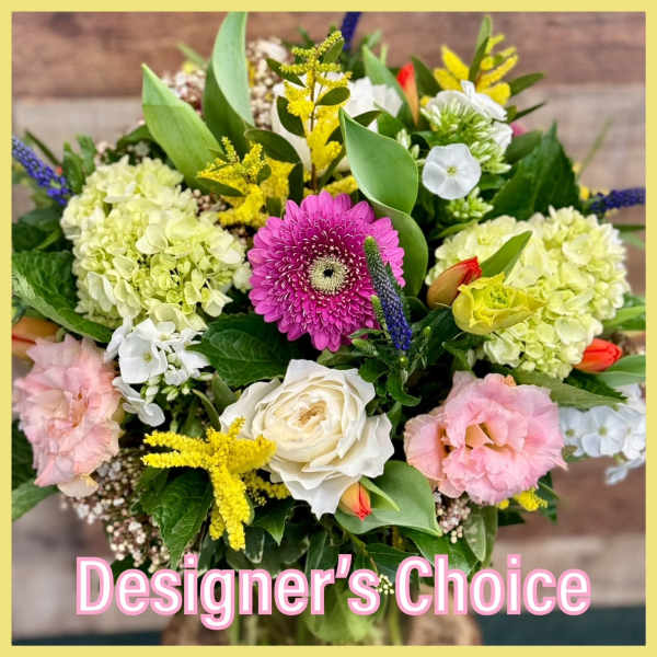 Mixed bouquet with pink gerbera, white roses, and pale hydrangeas