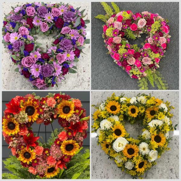 Four heart-shaped floral wreaths in purple, pink, red, and yellow-white tones