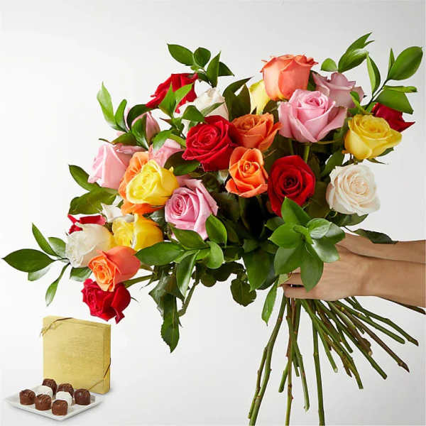 Handheld bouquet of multicolored roses with a box of chocolates