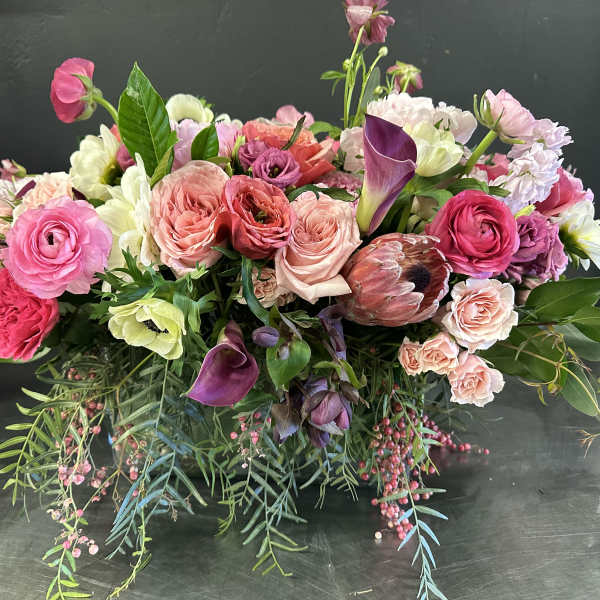 Large mixed bouquet with pink, peach, and white flowers