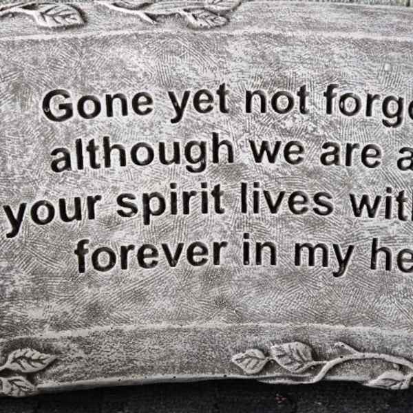 Rectangular gray memorial stone with heart cutouts and engraved verse about remembrance and love.