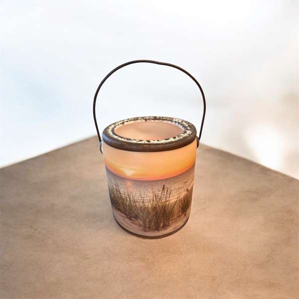 Small ceramic bucket with a beach sunset scene and wire handle