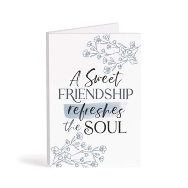Greeting card with floral line art and the words "A Sweet Friendship refreshes the Soul"