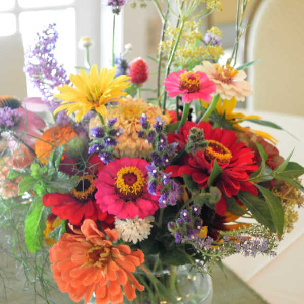Colorful mixed bouquet in a clear glass vase