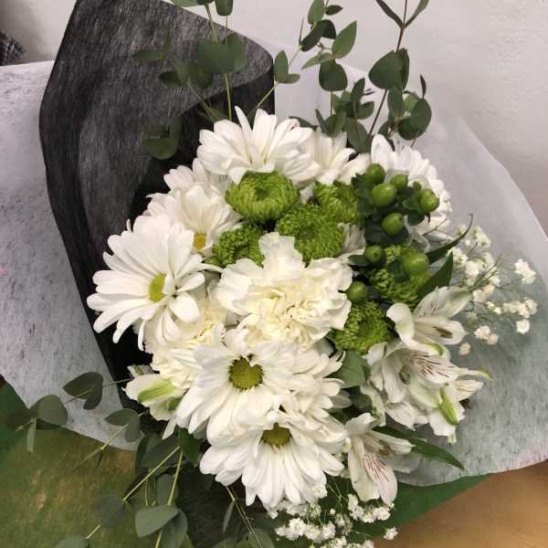 Bouquet of white daisies and green chrysanthemums with eucalyptus