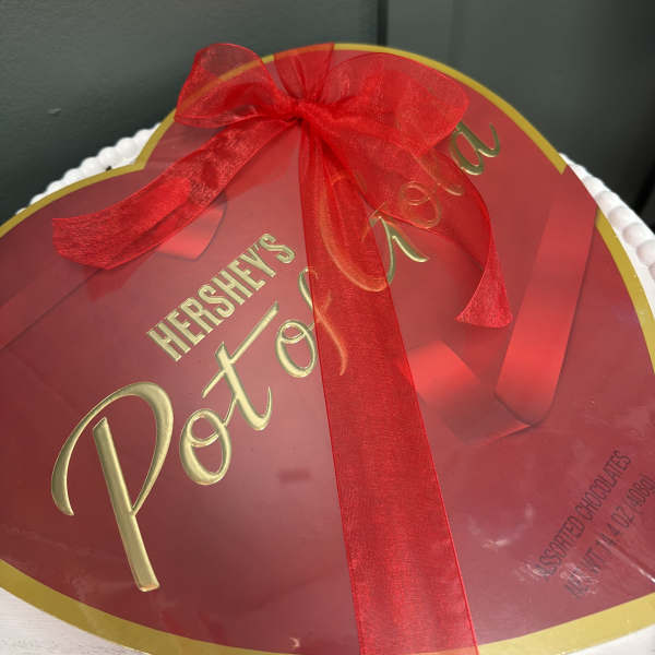 Heart-shaped Hershey's Pot of Gold chocolate box tied with a red ribbon