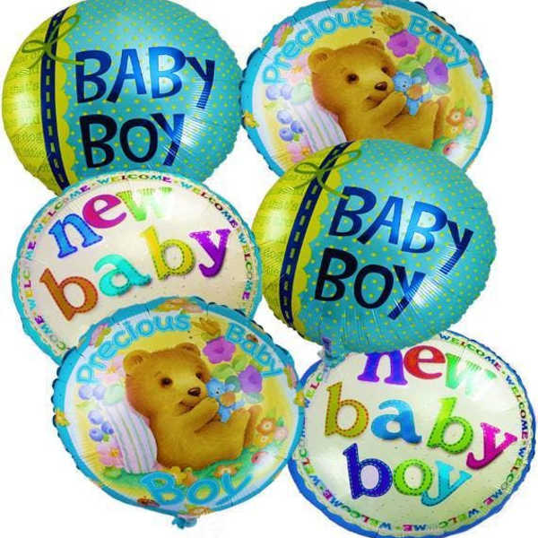Cluster of baby boy and teddy bear balloons on a white background
