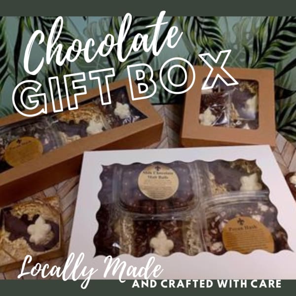 Chocolate gift boxes with assorted sweets and popcorn