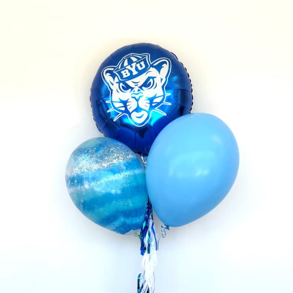Blue balloon bouquet with a BYU mascot balloon on a weighted base