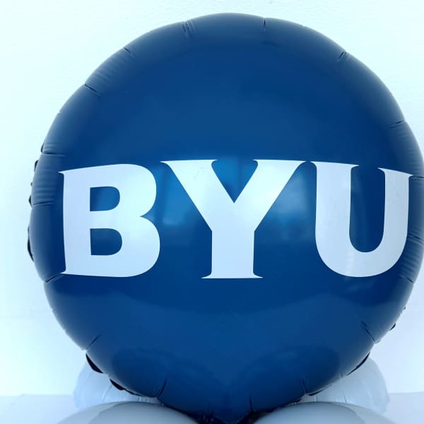 Blue balloon with large white BYU letters