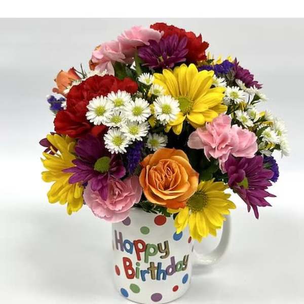 Mixed bouquet in a birthday mug