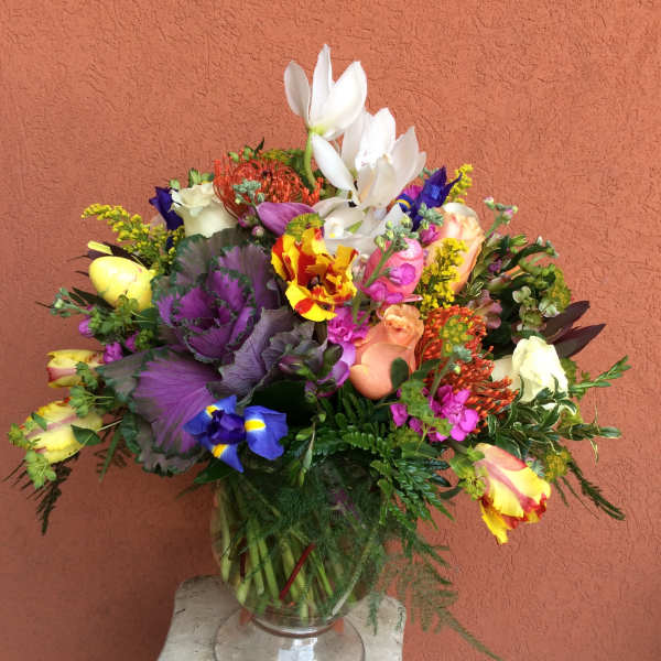 Colorful mixed bouquet in a clear glass vase