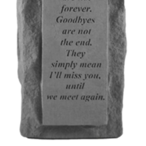 Rectangular memorial stone with engraved sympathy verse on rough rock background