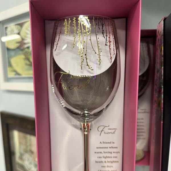 Decorative wine glass in a pink gift box with gold lettering