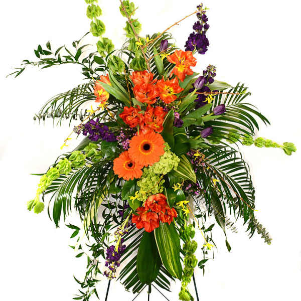 Tall tropical floral spray with orange and purple flowers